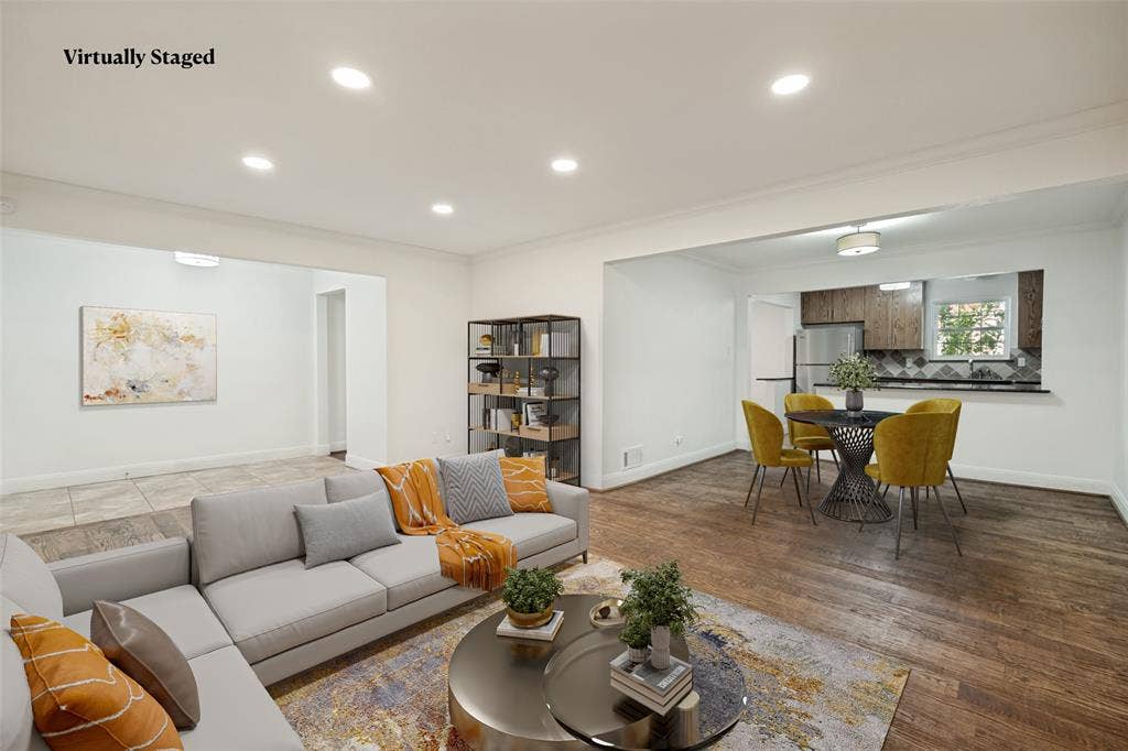 5818 E University Boulevard, #138, Dallas, TX 75206 Recessed lighting, wood-finish flooring, white walls, kitchen pass-through, stainless steel refrigerator