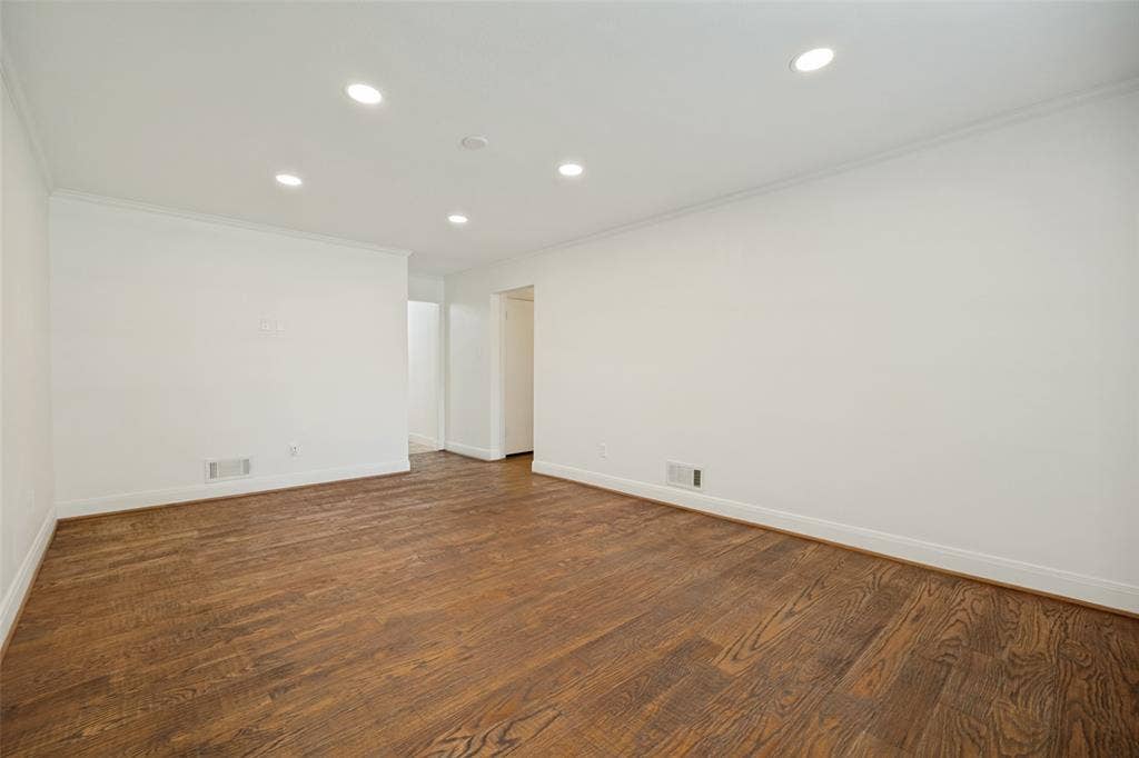 5818 E University Boulevard, #138, Dallas, TX 75206 Recessed lighting, crown molding, wood-finish flooring, white walls, and white trim