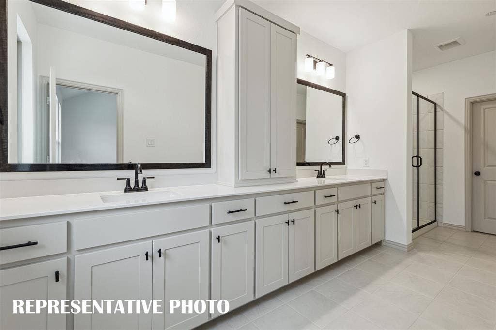 4755 Lunker Street, McKinney, TX 75071 Plenty of space for two in this wonderful owner's bath. REPRESENTATIVE PHOTO