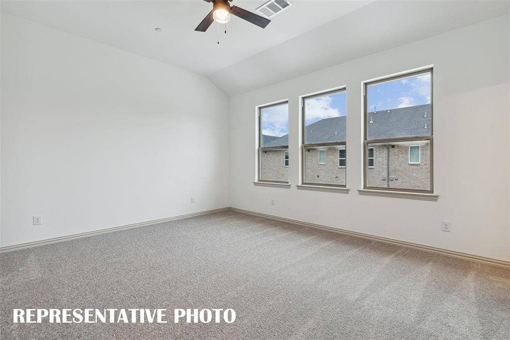 4755 Lunker Street, McKinney, TX 75071 An owner's suite that offers gorgeous finishes, high ceilings, tons of natural light....our Boyd floor plan has it all! REPRESENTATIVE PHOTO