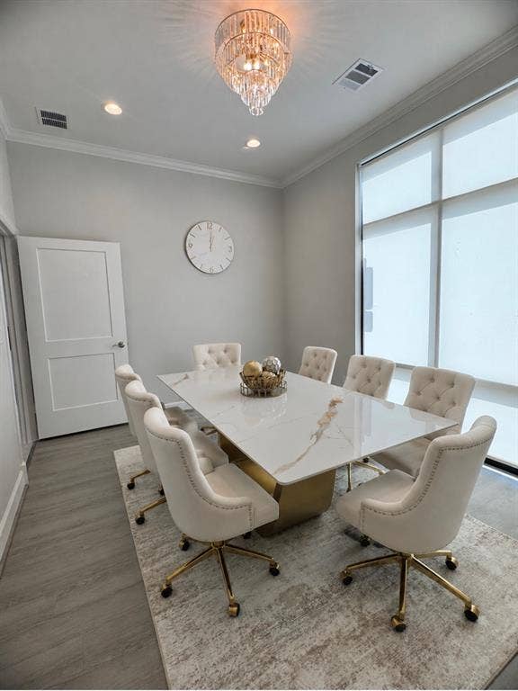 1630 W Prosper Trail, #930, Prosper, TX 75078 Crown molding, recessed lighting, crystal chandelier, wood-finish flooring, and roller shades