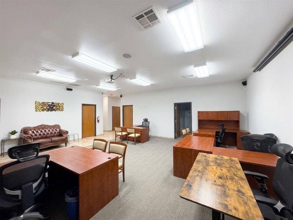 4512 Legacy Drive, #100, Plano, TX 75024 Spacious interior with neutral carpeting, recessed lighting, and multiple wood-finish doors