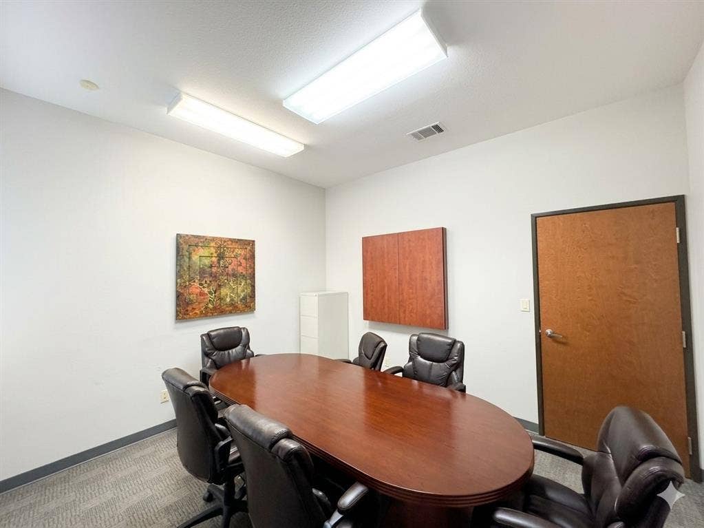 4512 Legacy Drive, #100, Plano, TX 75024 Recessed lighting and fluorescent light fixtures illuminate the space