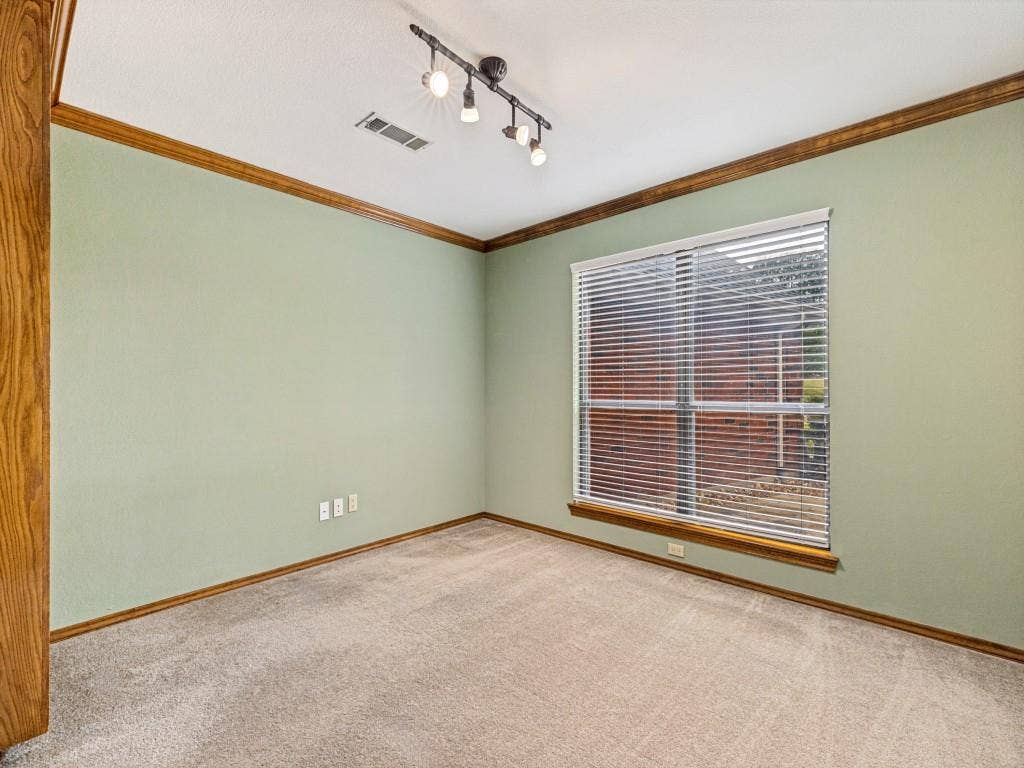 26 Lago Vista W, Wylie, TX 75098 Office with double doors and built in cabinet