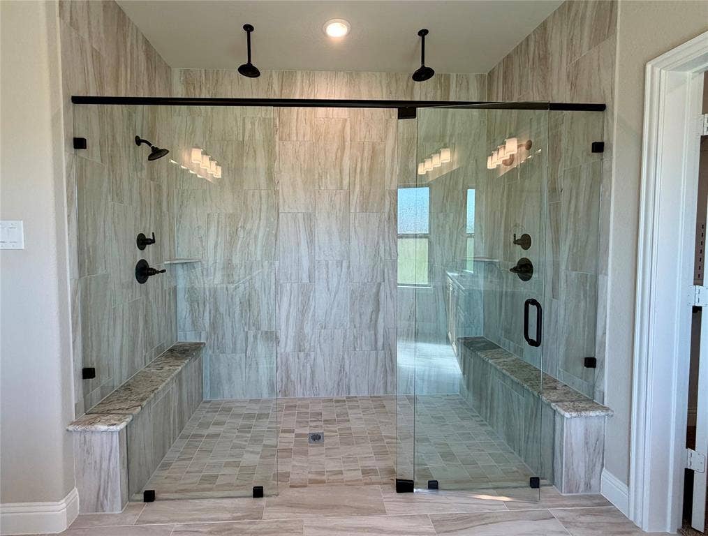 465 Aldred Street, Greenville, TX 75401 HUGE master shower with 2 granite benches, 2 shower heads & 2 rain heads!
