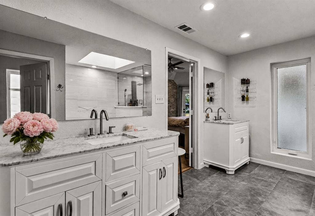 28 Victoria Drive, Rowlett, TX 75088 Dual vanity with stone countertops and undermount sinks