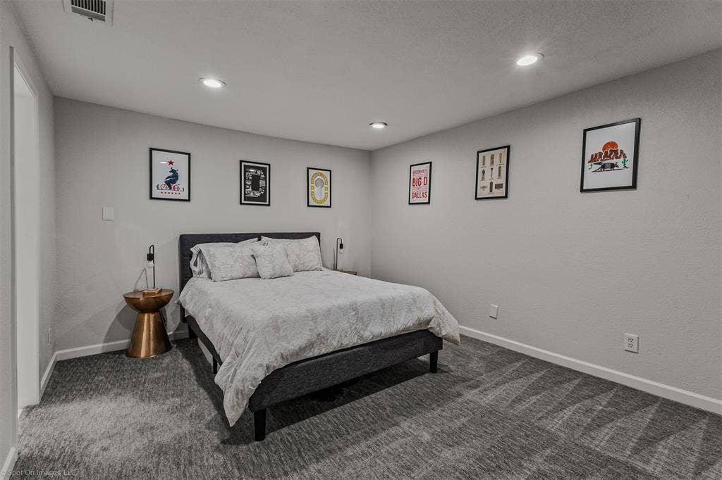 28 Victoria Drive, Rowlett, TX 75088 Recessed lighting, light gray wall paint, patterned gray carpeting, white trim, and a white ceiling