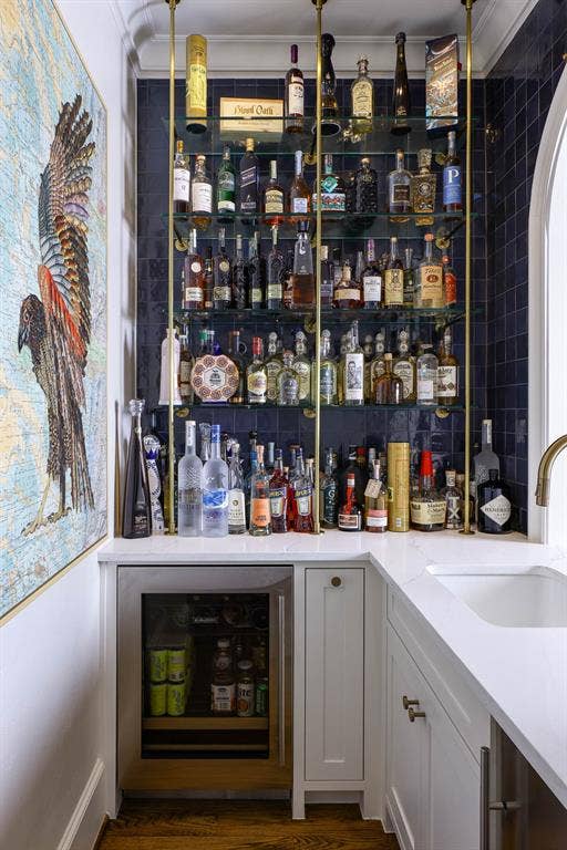 3637 Haynie Avenue, University Park, TX 75205 Wet bar with Sub-Zero beverage refrigerator, Scotsman ice maker, and built-in glass shelving