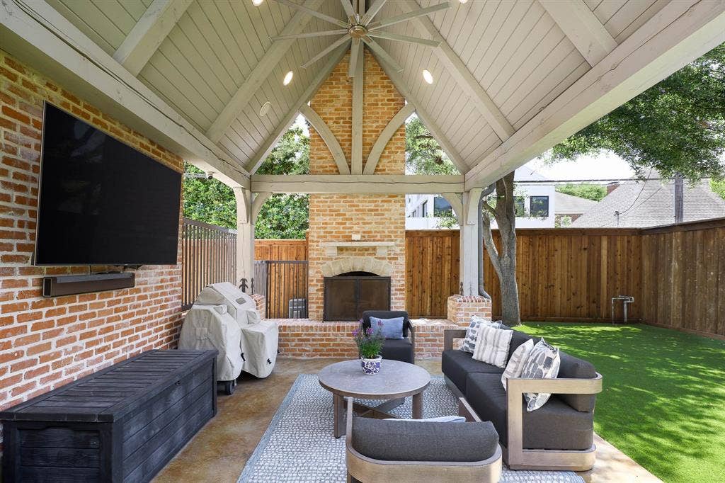 3637 Haynie Avenue, University Park, TX 75205 Outdoor covered loggia with wood beamed vaulted ceiling and gas fireplace