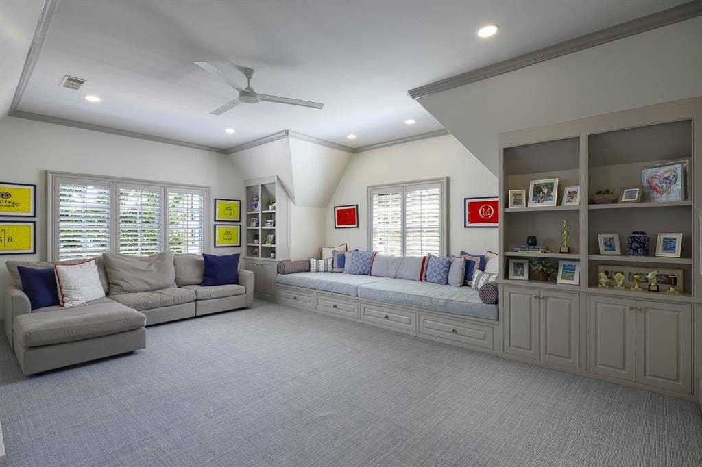 3637 Haynie Avenue, University Park, TX 75205 Playroom with oversized built-in window seat overlooking backyard and wet bar