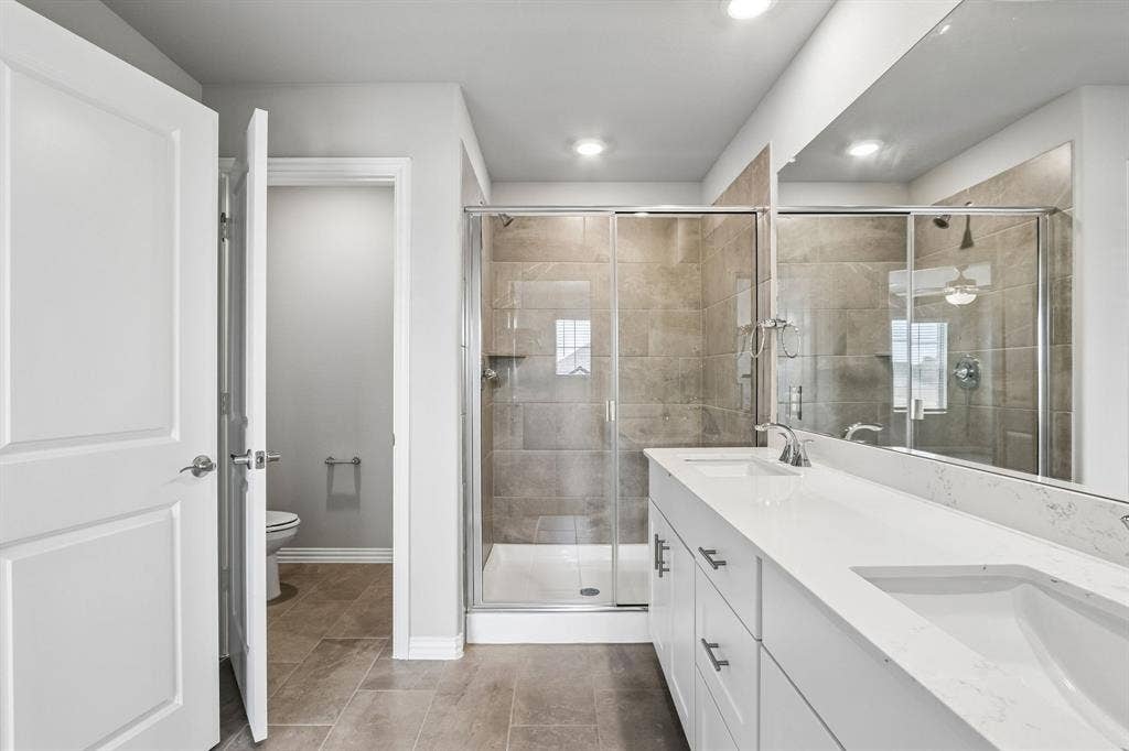 2717 Kobuk Drive, Corinth, TX 76210 Photo is not of the actual home, but is an inspirational photo of builder’s model home and may depict options, furnishings, and/or decorator features that are not included.