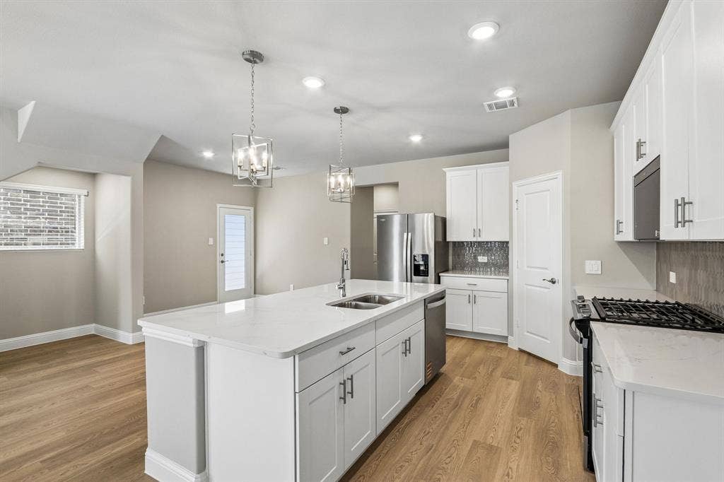 2717 Kobuk Drive, Corinth, TX 76210 Photo is not of the actual home, but is an inspirational photo of builder’s model home and may depict options, furnishings, and/or decorator features that are not included.