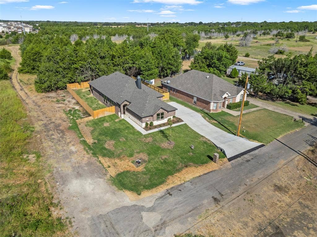 111 WATERCREST Lane, Glenn Heights, TX 75154 Brick and stone exterior with a gabled roof