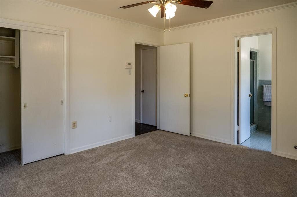 3807 Huaco Lane, Waco, TX 76710 Wall-to-wall carpeting with a ceiling fan light fixture