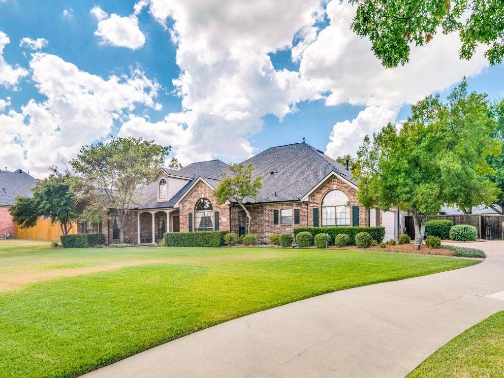 103 Texas Circle, Sunnyvale, TX 75182 Among many features, this home has a 3-car garage with workshop area.