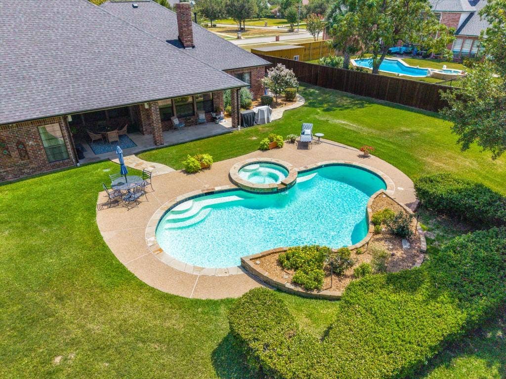 103 Texas Circle, Sunnyvale, TX 75182 Aerial view of the pool and spa.