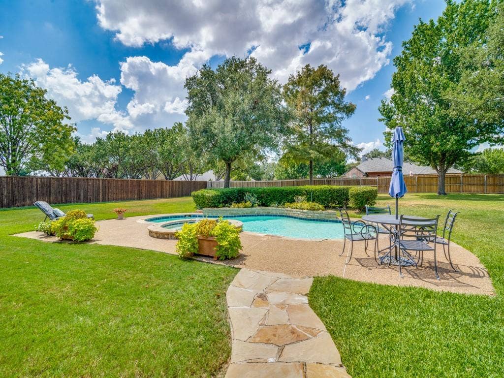 103 Texas Circle, Sunnyvale, TX 75182 Cool off in the Texas summers with this pool and spa!