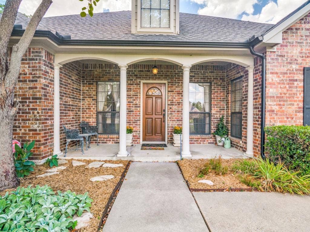 103 Texas Circle, Sunnyvale, TX 75182 Welcoming front entry with arches and columns.