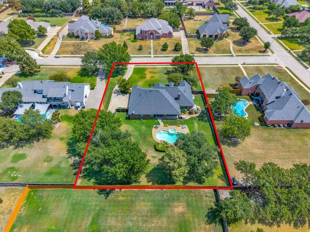 103 Texas Circle, Sunnyvale, TX 75182 Rear aerial view of the home.