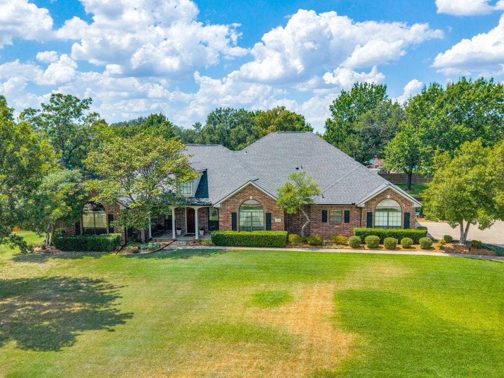 103 Texas Circle, Sunnyvale, TX 75182 Gorgeous curb appeal to this single story Custom home on a .71 acre lot with mature trees and landscaping!