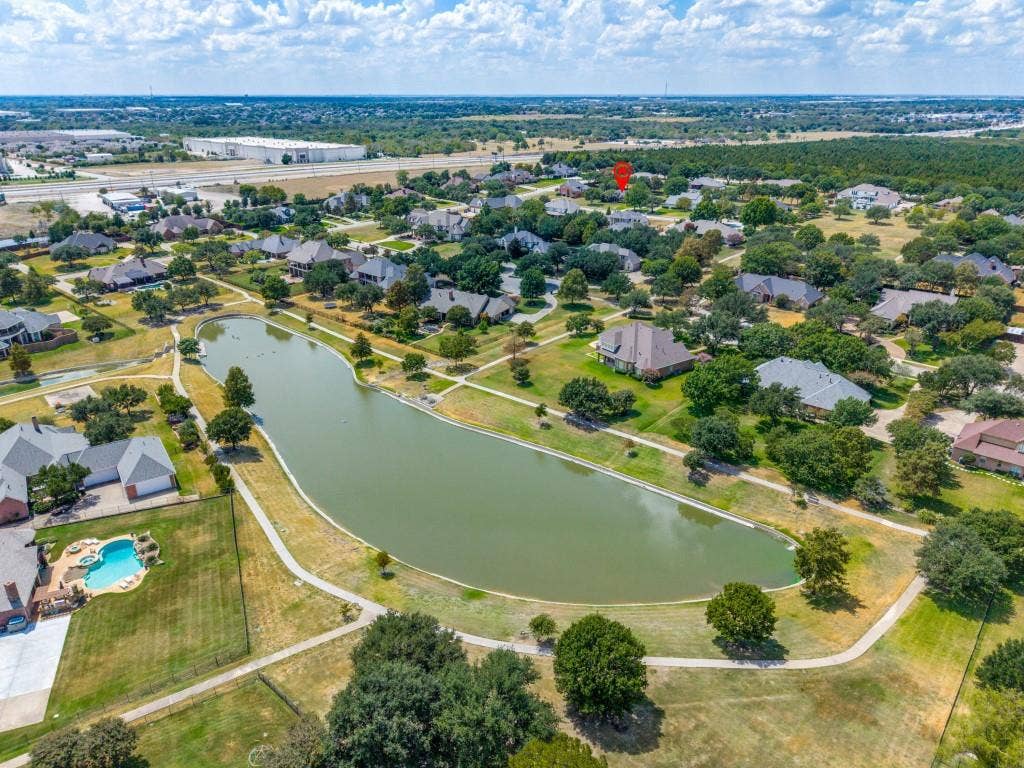 103 Texas Circle, Sunnyvale, TX 75182 View of the lake in this subdivision with walking trails and catch and release fishing. Ducks, geese, and turtles abound!