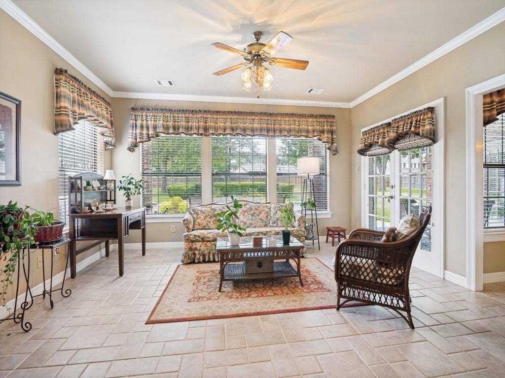 103 Texas Circle, Sunnyvale, TX 75182 Abundant natural light in this sun room with panoramic views of the pool and back yard.
