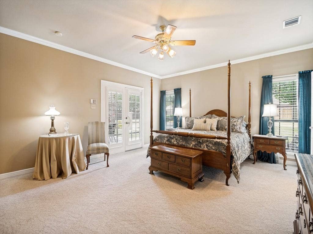 103 Texas Circle, Sunnyvale, TX 75182 This oversized primary bedroom has access to the covered patio.