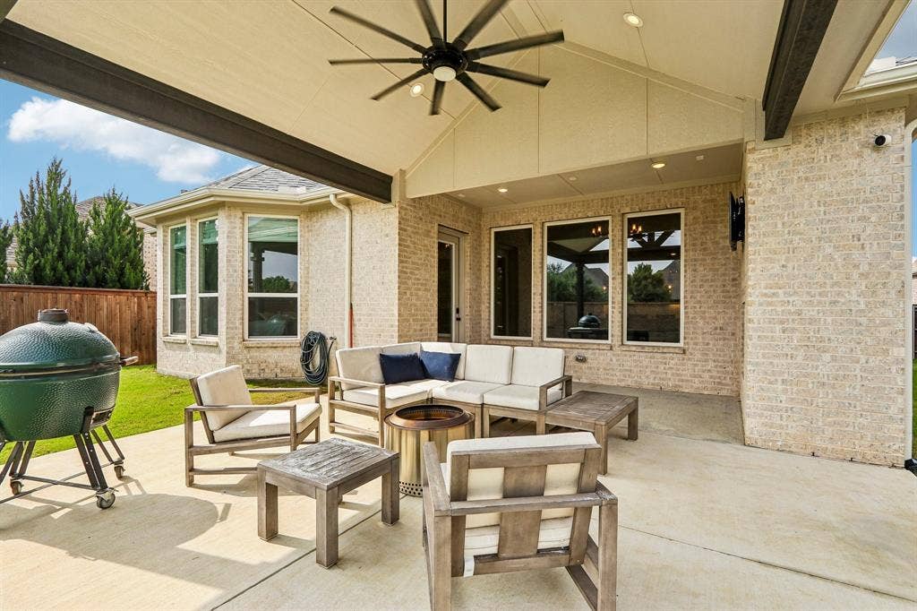 1657 Lilac Lane, Celina, TX 75009 Covered outdoor patio with a ceiling fan, recessed lighting, and a brick exterior