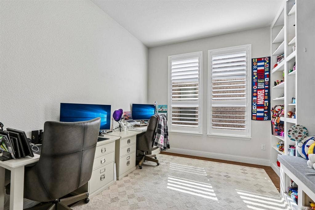 1657 Lilac Lane, Celina, TX 75009 Recessed wall shelving, two windows with louvered shutters, and wood-finish flooring