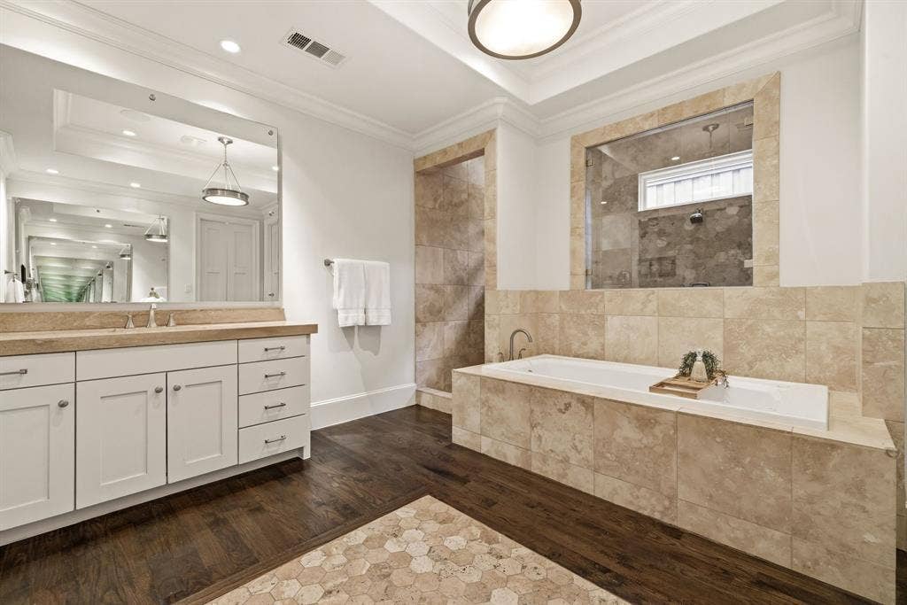6635 Park Lane, Dallas, TX 75225 Oversized bathroom leads to larger walk-in closet, and cedar closet with W/D hook ups for 1st floor laundry.