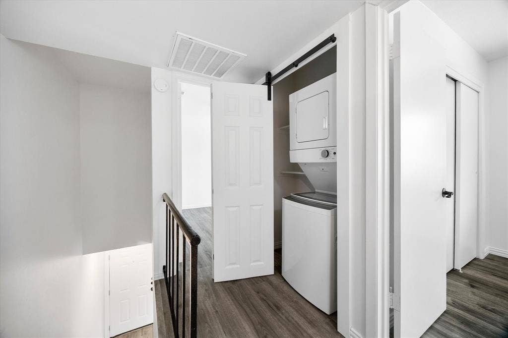 4011 Cole Avenue, #111, Dallas, TX 75204 Laundry closet with stacked washer and dryer included.