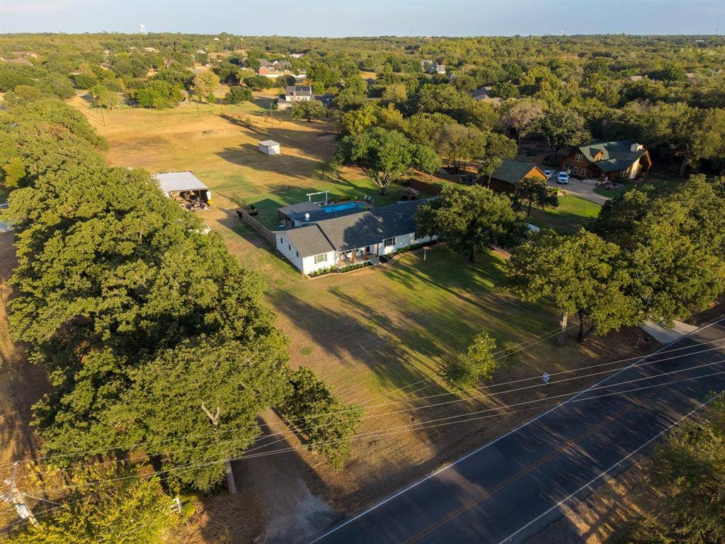 6155 Stephenson Levy Road, Fort Worth, TX 76140 This aerial sky view showcases the entire property