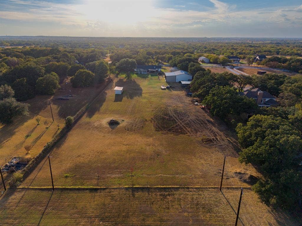 6155 Stephenson Levy Road, Fort Worth, TX 76140 This great sky view shows the depth of the property and how it is cleared and ready to be used however needed! Completely fenced in and perfect to bring your horses.