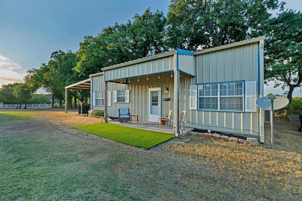 6155 Stephenson Levy Road, Fort Worth, TX 76140 Front of the adorable guest home, with its own covered front porch and covered parking.