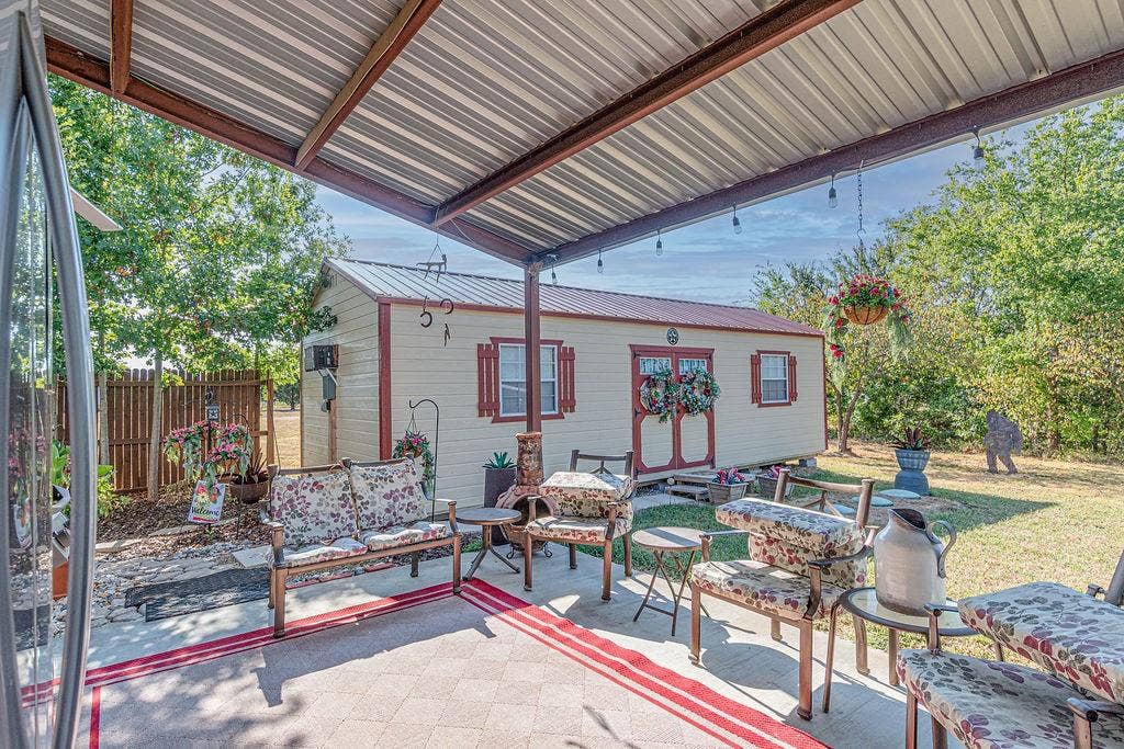 4129 County Road 4111, Campbell, TX 75422 Side porch and one of three workshops with electric, heat, and air.
