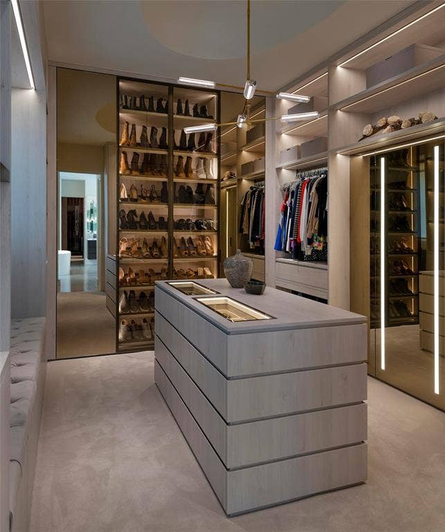 6039 Waggoner Drive, Dallas, TX 75230 Eggersmann designed custom closet with sitting area