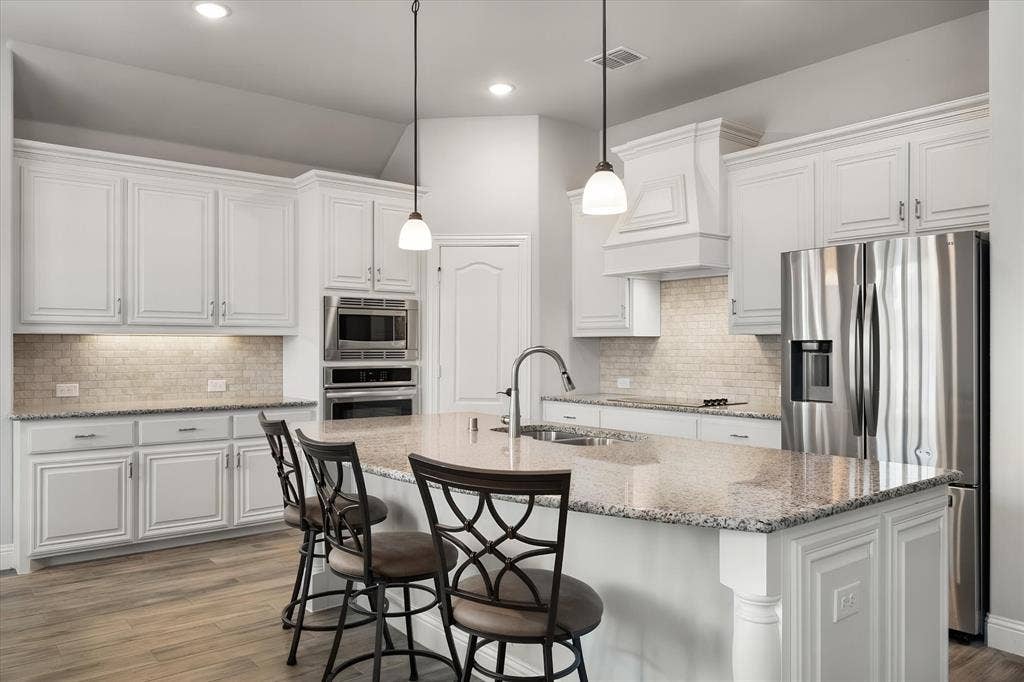 2442 Turning Leaf Lane, Midlothian, TX 76065 Corner pantry and built in microwave and ovens