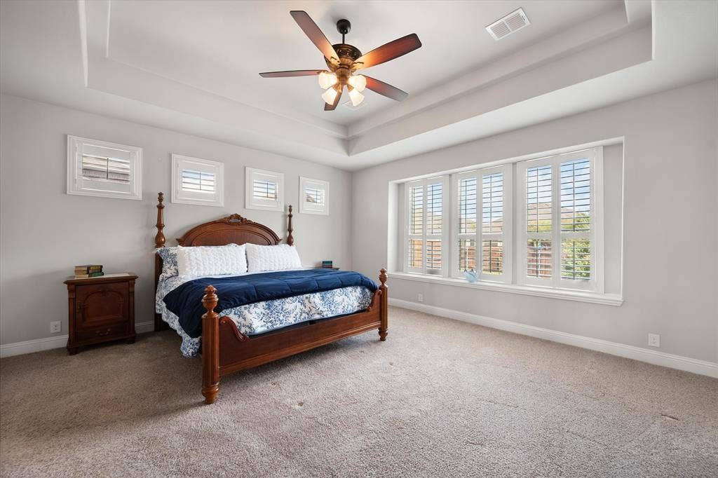 2442 Turning Leaf Lane, Midlothian, TX 76065 Primary bedroom with large wall of windows