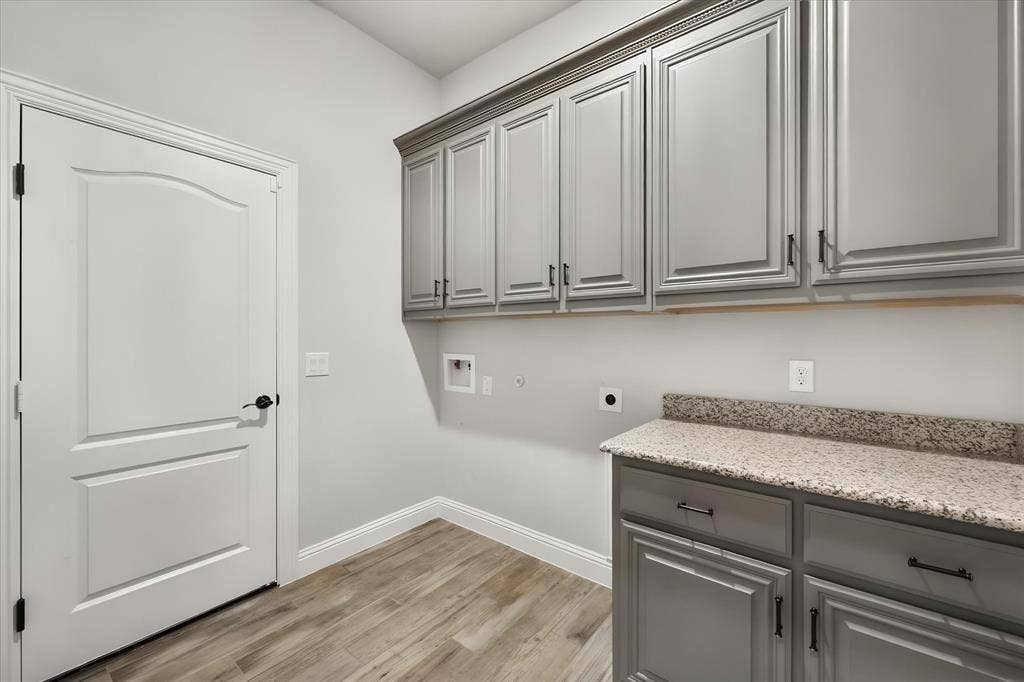 2442 Turning Leaf Lane, Midlothian, TX 76065 Large laundry room off the third bay garage