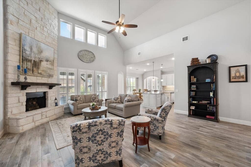 2442 Turning Leaf Lane, Midlothian, TX 76065 Corner fireplace with floor to ceiling stone accents