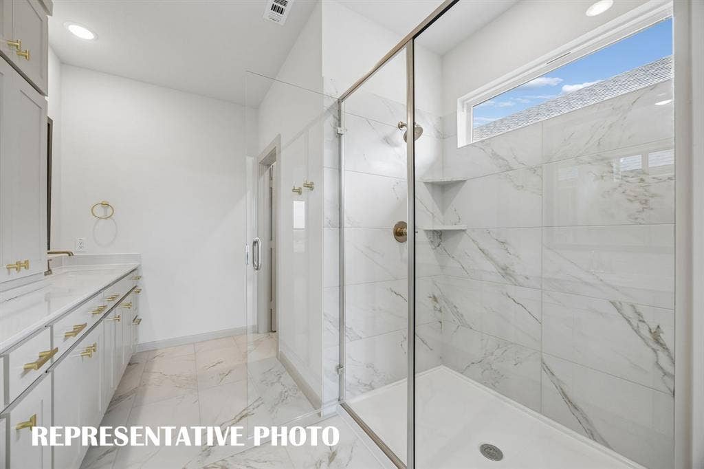 4608 Reveille Drive, McKinney, TX 75071 Featuring an oversized walk in shower, long luxurious showers are in your future! REPRESENTATIVE PHOTO
