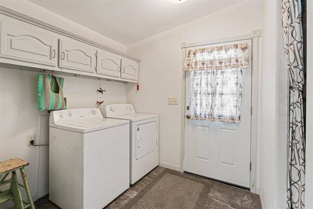 Large laundry room with storage