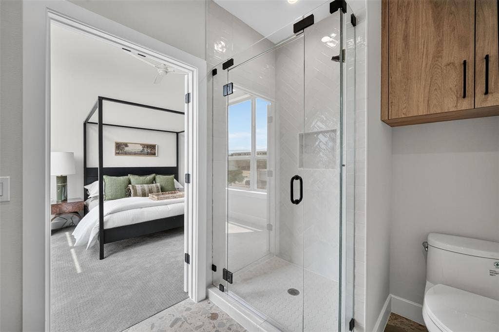 frameless shower with terrazo tile floors