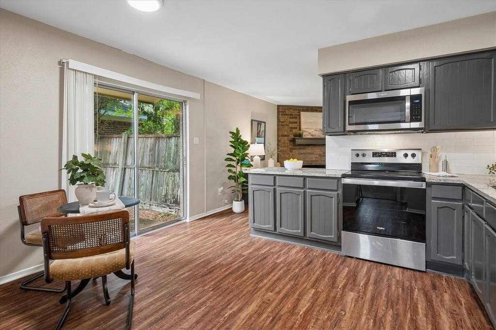 1213 Frio Lane, Garland, TX 75040 Updated kitchen with open-ness to the living room.