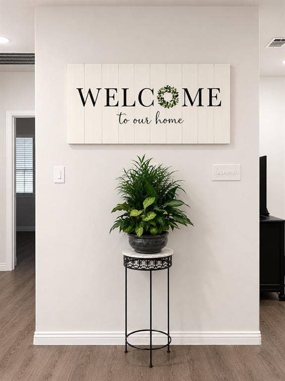 714 N Wofford Street, Athens, TX 75751 Wood-finish flooring with crisp white walls