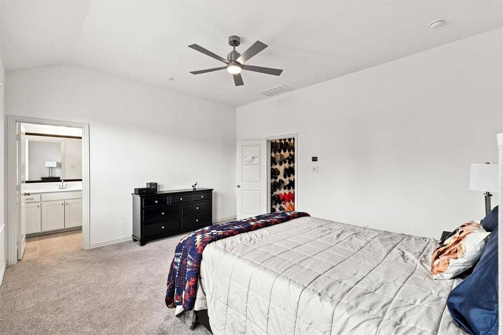 4833 Lunker Street, McKinney, TX 75071 More than a bedroom—it’s a true suite. Generous proportions, a vaulted ceiling, and direct access to the private bath create an impressive owner’s retreat.