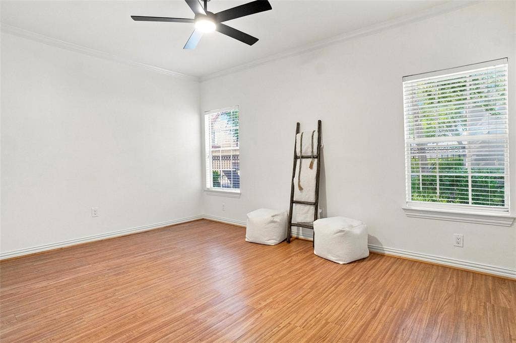 2601 Preston Road, #4103, Plano, TX 75093 Wood-finish flooring, white walls, and crown molding