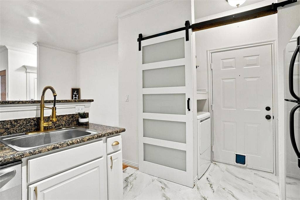 2601 Preston Road, #4103, Plano, TX 75093 Kitchen sink with gold-finish gooseneck faucet and granite-look countertop