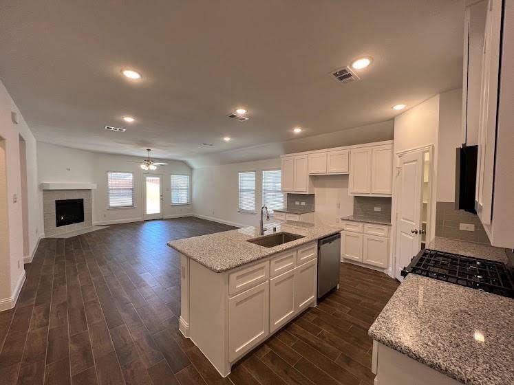 1408 Rendyn Street, Anna, TX 75409 Spacious kitchen with a center island, white cabinetry, and granite countertops