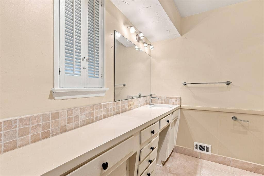 Lots of Space to Install Double Vanities or Keep the Art Deco Originals